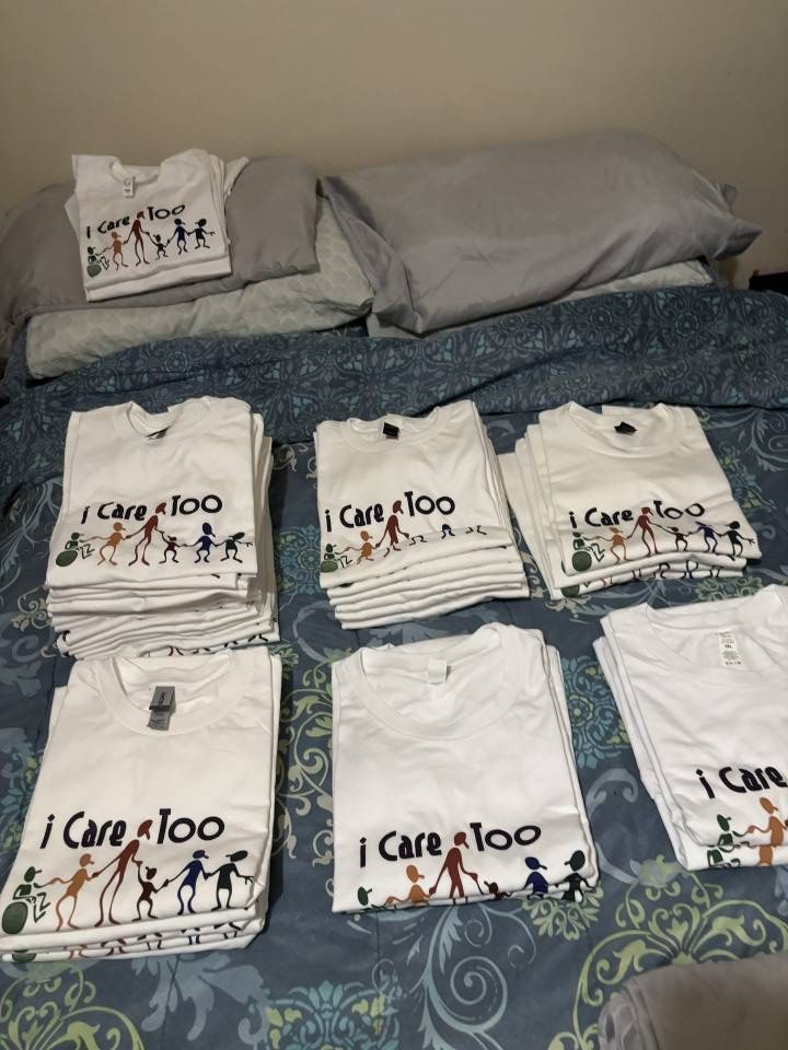Stacked t-shirts with printed text